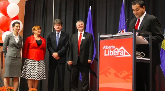 Raj Sherman (right) accepts the Alberta Liberal Party leadership in 2011. To the left: Leadership chairperson Josipa Petrunic, MLA Laurie Blakeman, MLA Hugh MacDonald and candidate Bruce Payne.
