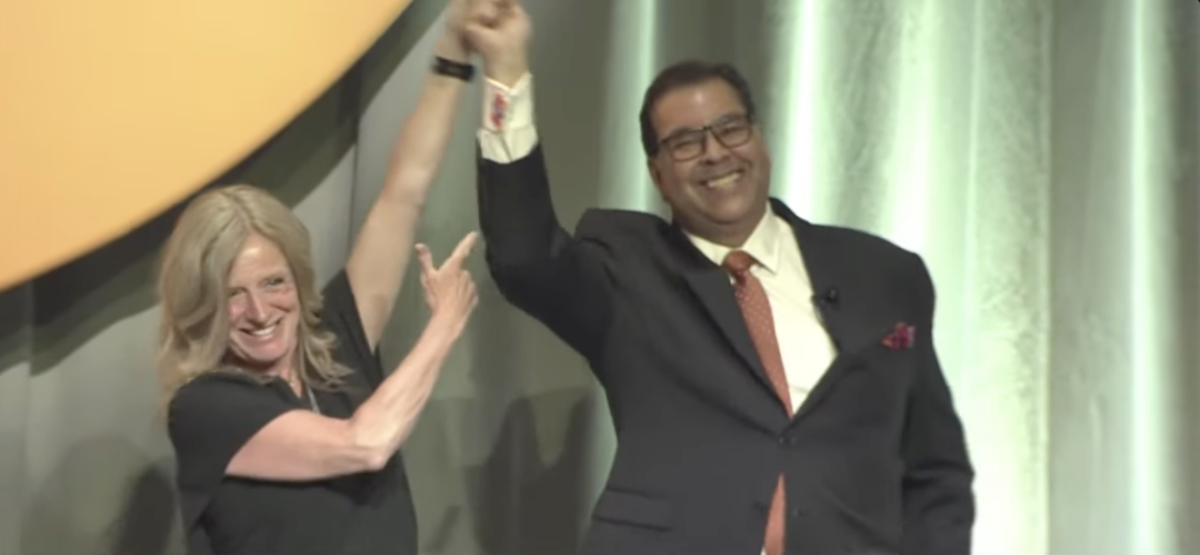 Rachel Notley and Naheed Nenshi at the announcement of the NDP leadership vote results (source: Alberta NDP / YouTube)
