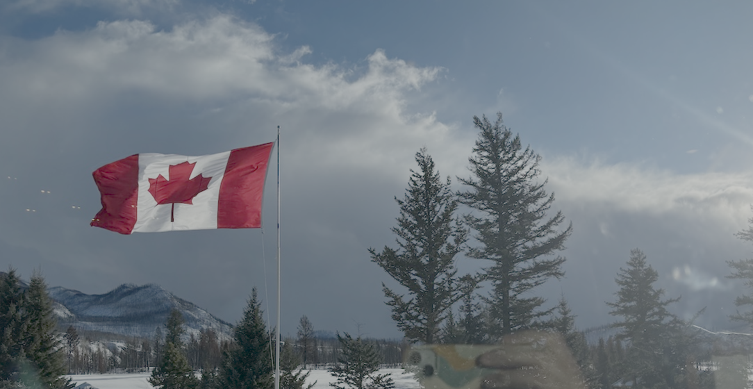 The Canadian flag waving in the wind in Jasper National Park in January 2025 (source: Dave Cournoyer)