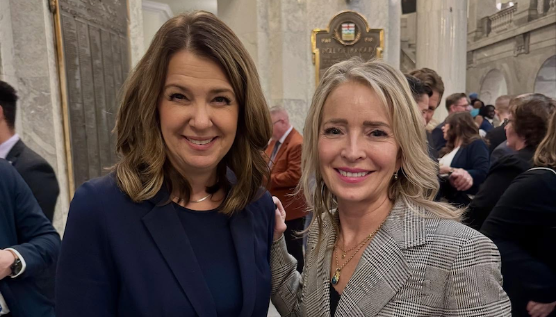 Premier Danielle Smith and Cynthia Moore in 2025 (source: Cynthia P. Moore / Facebook)