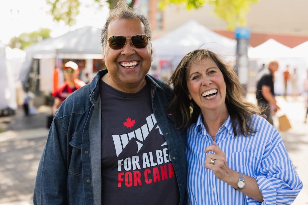 Alberta NDP leader Naheed Nenshi and Trisha Estabrooks at the NDP’s annual Art Walk event on Whyte Avenue in July 2026 (source: Trisha Estabrooks / Facebook)