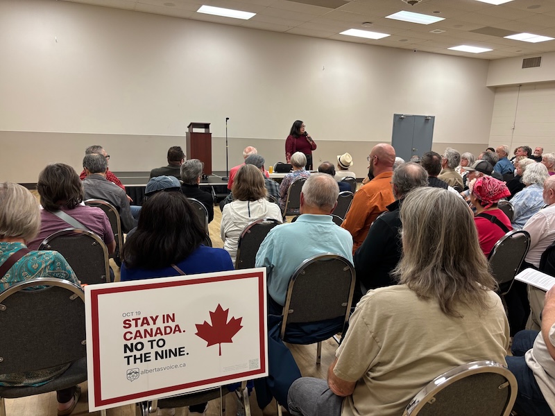 Calgary-Klein MLA Lizette Tejada speaks to a crowd of constituents at her referendum town hall (source: Dave Cournoyer)